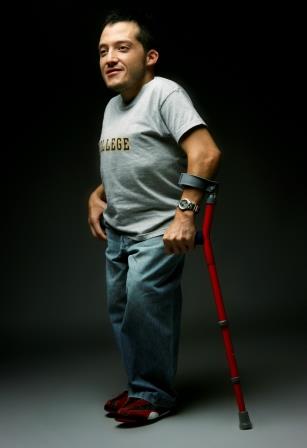 portrait of a man using crutches